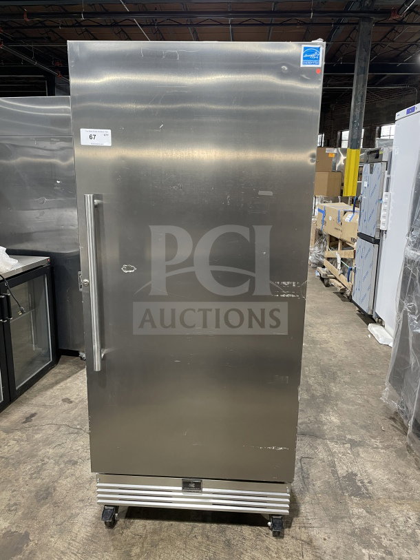 Kelvinator Commercial stainless steel freezer, model KCBM180FQYA, Energy Star certified, single door, on casters, with rack.