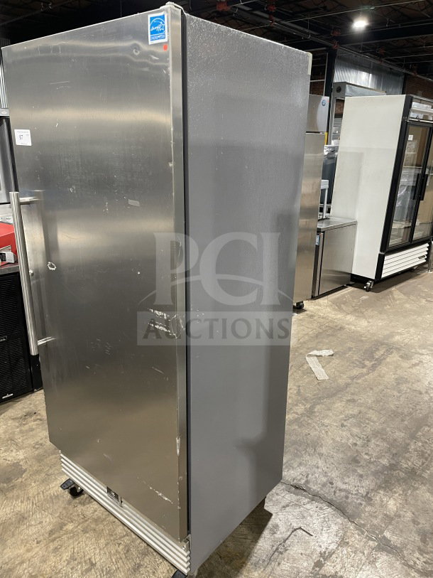 Kelvinator stainless steel reach-in freezer, model KCBM180FQYA. Energy Star certified, 115V, on casters, with poly-coated rack.