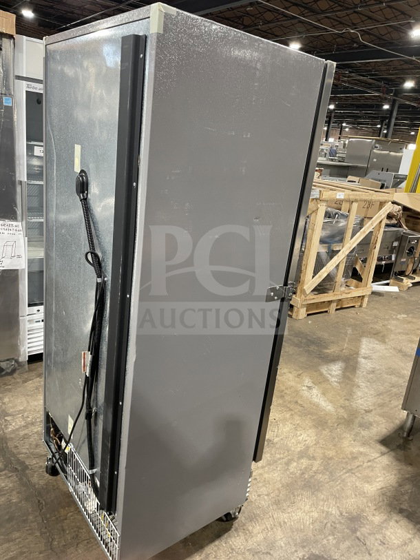 Kelvinator commercial stainless steel single door freezer, model KCBM180FQYA, on casters, with poly coated rack.