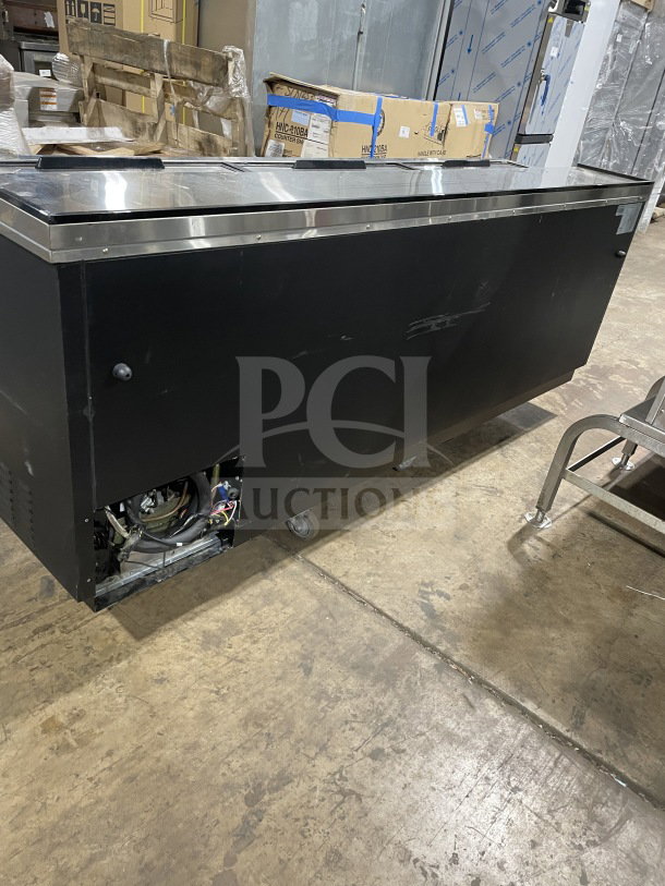 Avantco 95" commercial black beer bottle cooler, model 178JBC95B, with three sliding doors on casters. 115V, SN: 9133190014.