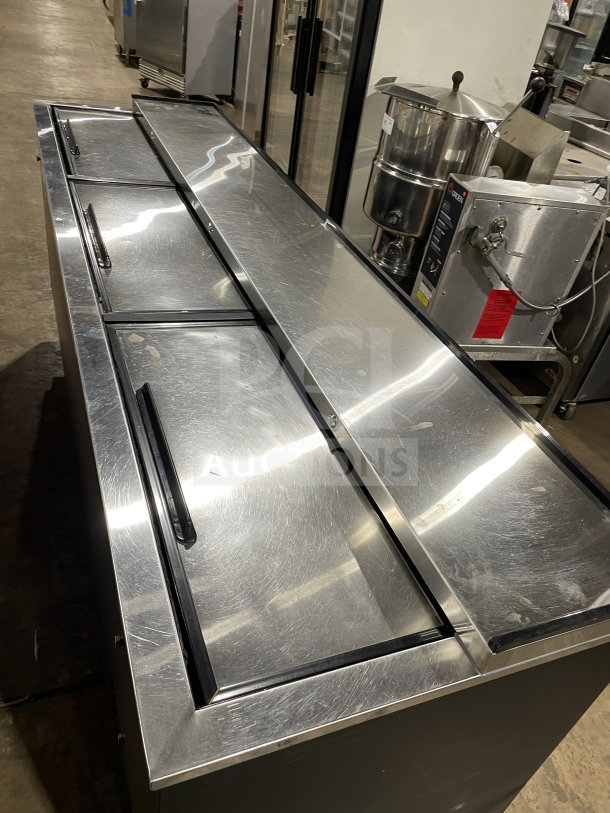 Avantco 95" commercial beer bottle cooler, model 178JBC95B, black, with three sliding doors and casters, 115V.
