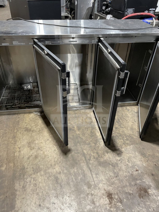 Krowne BS84LBSSRRR 3-door bar cooler, black, poly-coated wire racks, 115V, excellent condition, serial SN: 0011858.
