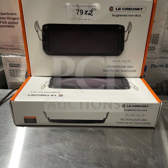 Alt text: Le Creuset Toughened Nonstick 10"x14" Rectangular Griddle in box, brand new condition, auction label visible.