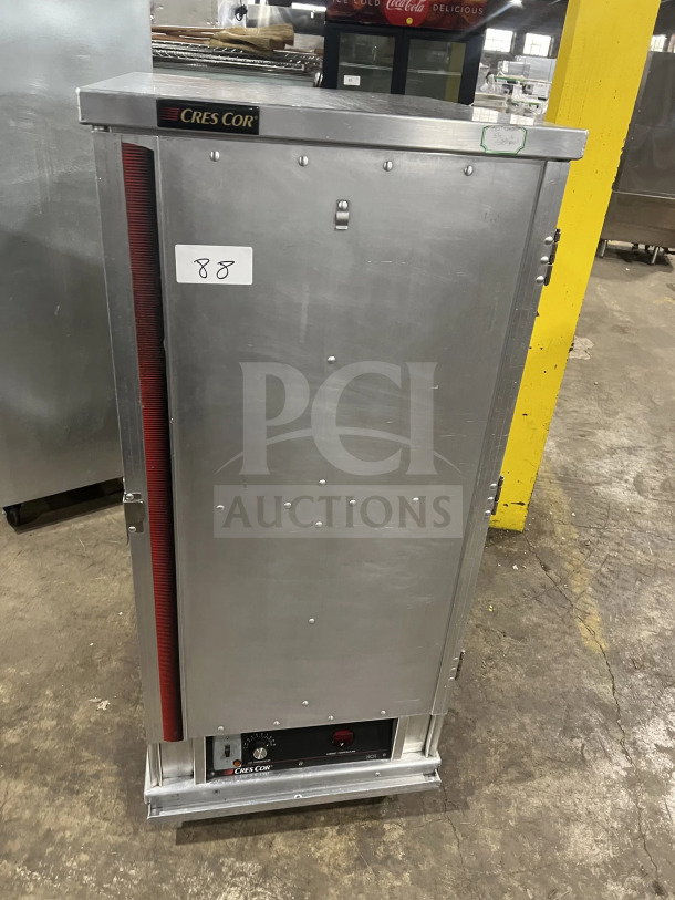Cres Cor stainless steel heated holding/proofing cabinet, model 1290006, with built-in pan slides, on casters.