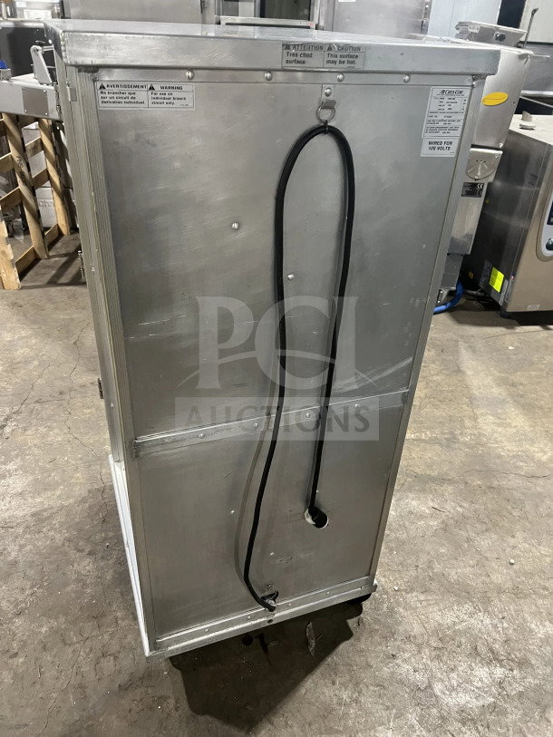 Cres Cor stainless steel heated holding/proofing cabinet, model 1290006, with pan slides and casters, 120V, SN: HJF-K4247B.