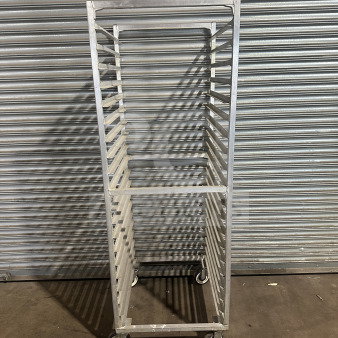 Commercial stainless steel heavy-duty sheet pan rack on casters, excellent condition, multiple shelves, durable design.