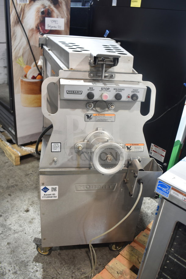 2016 Hobart MG2032 meat mixer grinder, 208V, 3-phase, commercial floor style, stainless steel, visible control panel, asset ID label.