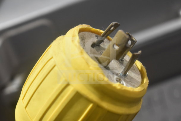 Close-up of a plug from 2016 Hobart MG2032 Commercial Meat Mixer Grinder, 208V, 3-Phase. Yellow casing visible.