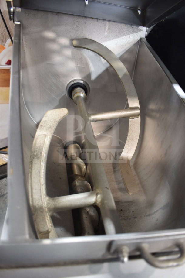 2016 Hobart MG2032 commercial meat mixer grinder, 208V 3-phase, stainless steel, used condition. Interior view of grinding components.