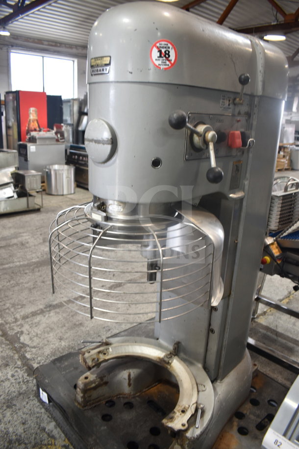 Hobart M-802 commercial 80-quart dough mixer with bowl adapter, guard, and hook. 200V, 3-phase. Shows signs of use.