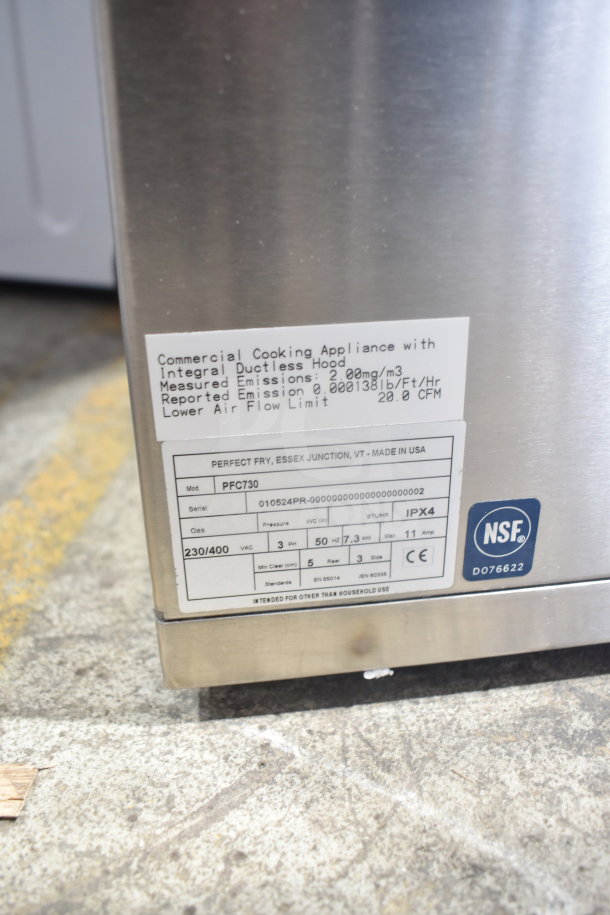 Brand new 2024 Perfect Fry PFC730 ventless countertop deep fryer. Scratch and dent condition. 230/400 volts, 3 phase. Labels show specifications and NSF certification.