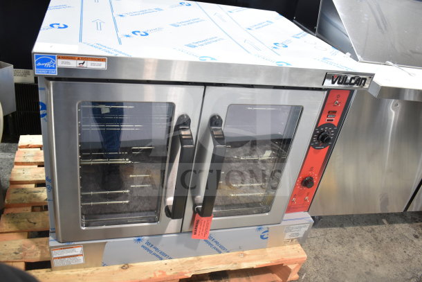 Brand new Vulcan VC4GD-11D150K commercial convection oven with view-through doors, thermostatic controls, minor scratches.