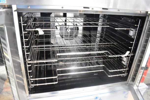 Brand new Vulcan VC4GD-11D150K convection oven with view-through doors, thermostatic controls, and multiple racks.