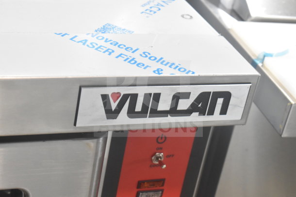 Brand new Vulcan VC4GD-11D150K convection oven, full size, view-through doors, thermostatic controls, minor scratches.