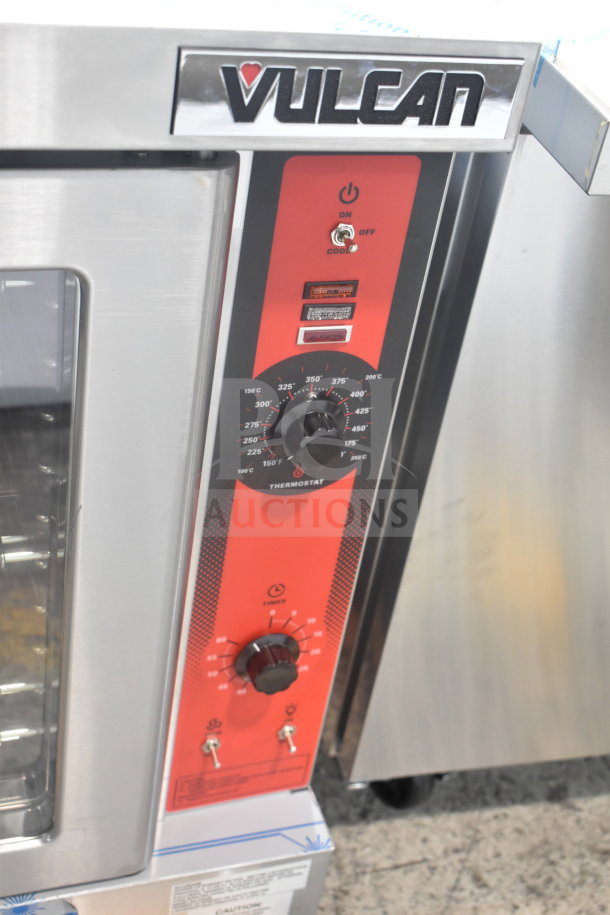 Brand new Vulcan VC4GD-11D150K convection oven with view doors, thermostatic controls, minor scratches and dents.