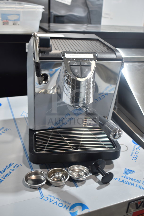 Brand new Nuova Simonelli OSCAR II AD espresso machine, countertop model. Includes portafilter baskets and tamper. 110-120 Volts.