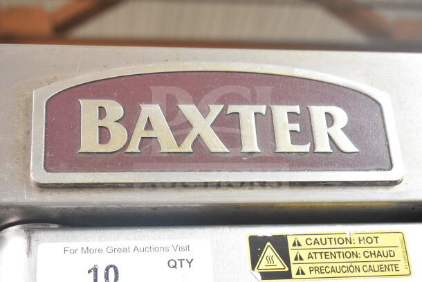 Baxter OV310G Commercial Gas Rotating Rack Oven, 95,000 BTU, on double pan rack with casters. Features caution label.