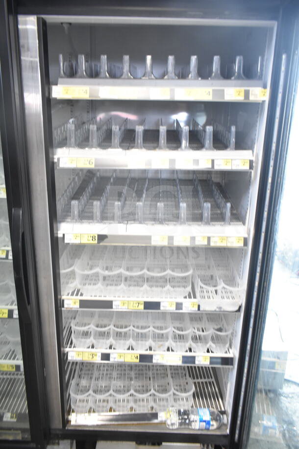 2018 True GDM-49-HC commercial cooler, two doors, multiple shelves, good condition, tested, 115 volts, 1 phase.