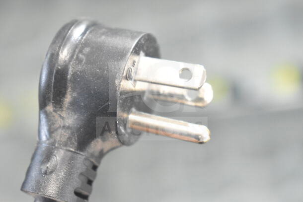 Close-up of a three-prong power plug for the 2018 True GDM-49-HC Commercial Cooler, 115 volts, 1 phase.