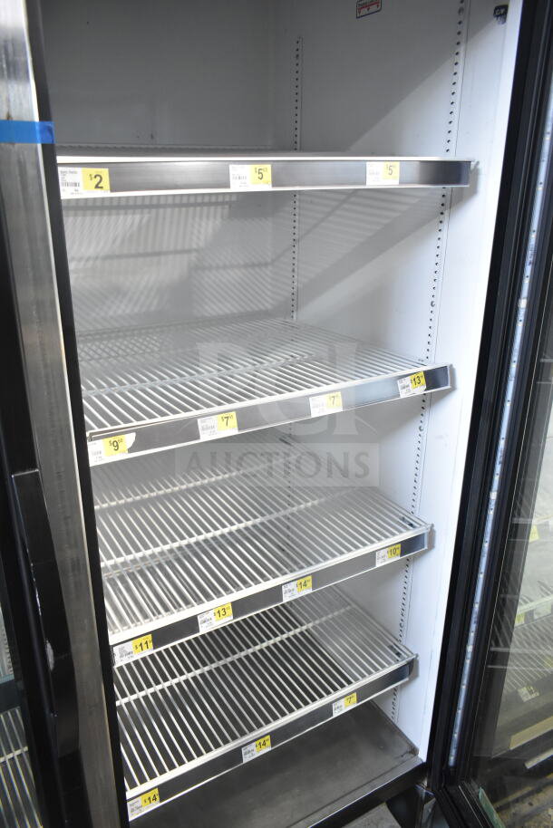 2018 True GDM-49-HC commercial cooler with two glass doors. Includes adjustable shelves. 115 volts, 1 phase, tested and working.