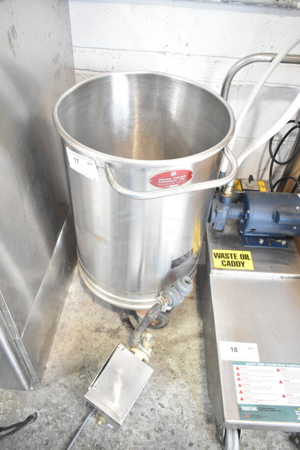 Oscar Fisher stainless steel tank with handles, visible Oscar Fisher logo, in good condition, near waste oil caddy.