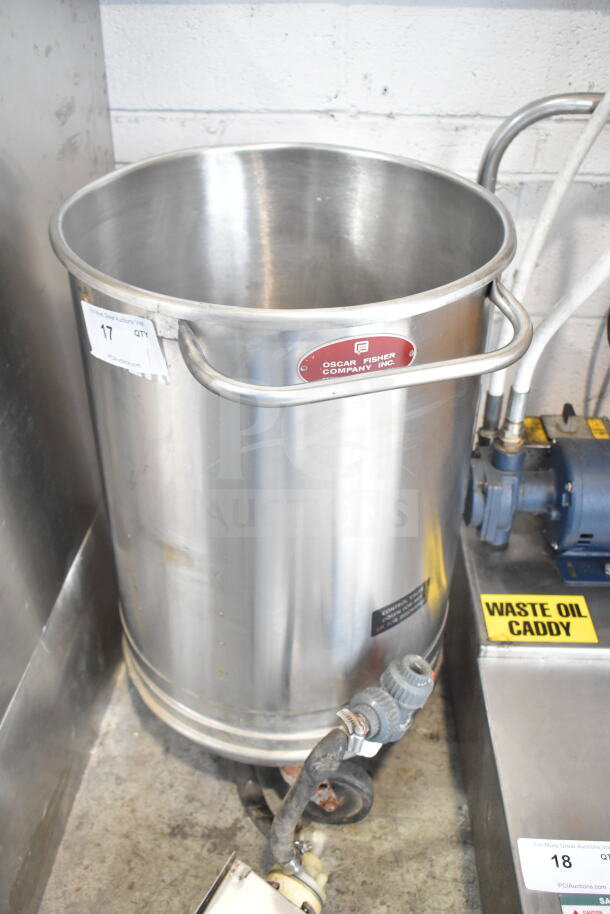 Oscar Fisher stainless steel tank with industrial valve, label stating "Oscar Fisher Company Inc.", in good condition.