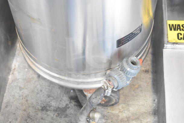 Oscar Fisher Stainless Steel Tank with visible control valve and hoses, minor surface marks, durable condition.