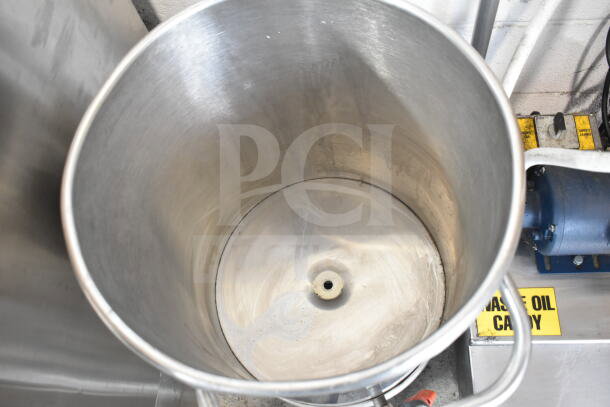 Oscar Fisher stainless steel tank, open top, cylindrical shape, interior view, sturdy handles, excellent condition.