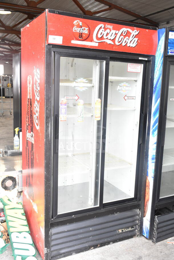 True GDM-33 Commercial 2 Door Cooler Merchandiser with Coca-Cola branding. 115 Volts, 1 Phase, good condition.