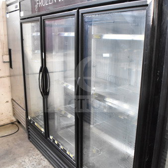 2018 True GDM-72F-HC 3-door reach-in freezer merchandiser, black frame, "Frozen Treats" label, tested working condition.