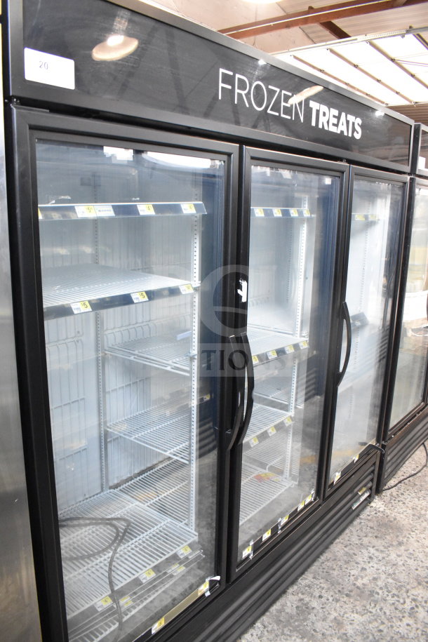 2018 True GDM-72F-HC commercial 3-door freezer merchandiser, tested and working, glass doors, black finish, "Frozen Treats" signage.