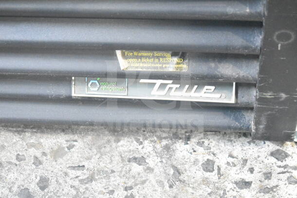 2018 True GDM-72F-HC commercial freezer, 3-door, natural refrigerant label, "True" branding, tested and working.