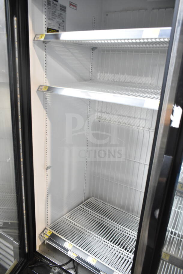 2018 True GDM-72F-HC commercial 3-door freezer with shelving. Tested, working, 115/208-230V, 1 phase. Clean interior.