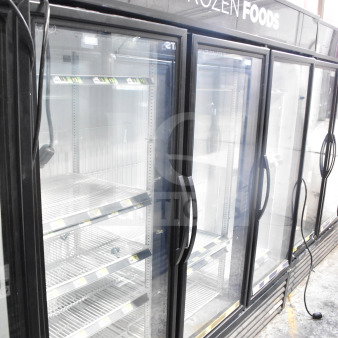 2018 True GDM-72F-HC commercial 3-door freezer, glass doors, black trim, "Frozen Foods" signage, tested and working.