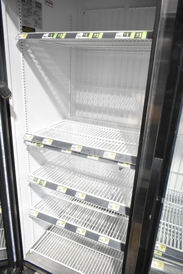 2018 True GDM-72F-HC 3 door freezer, clean interior, tags show pricing labels, tested and working condition.