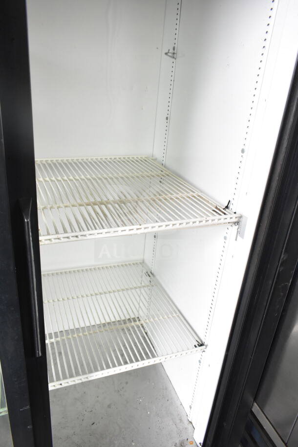 True GDM-37 Commercial 2 Door Cooler Merchandiser, 115V, white interior with adjustable wire shelves.