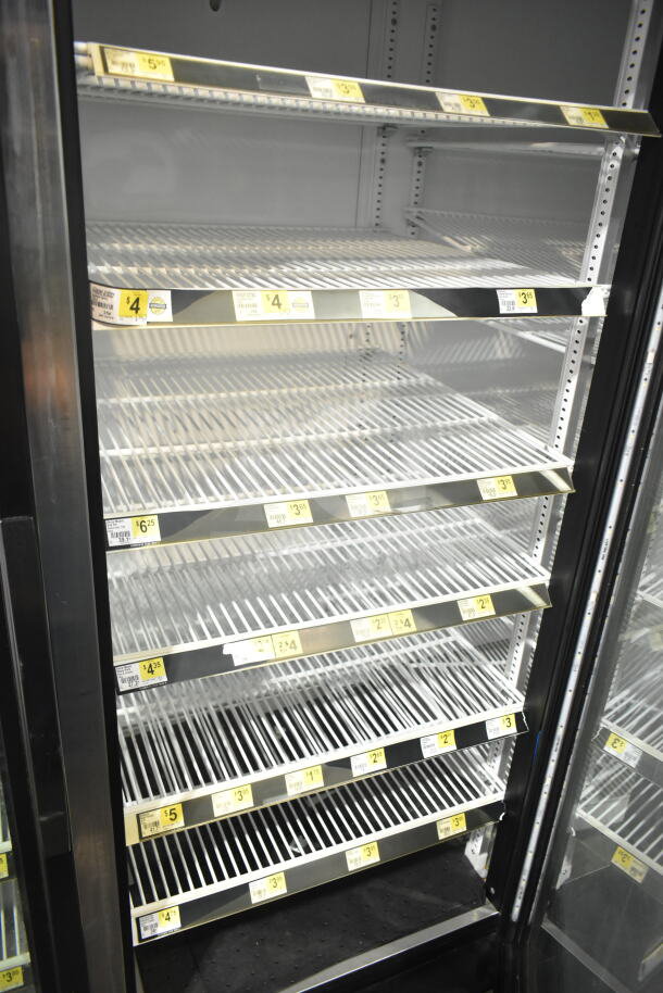 2018 True GDM-72-HC commercial cooler, 3 glass doors, adjustable shelving, 115V, 1 phase, tested working, ideal for merchandising.