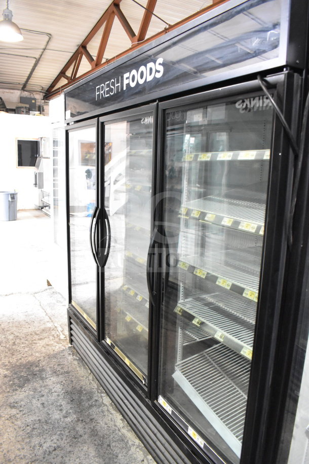 2018 True GDM-72-HC 3 Door Reach-In Cooler Merchandiser, 115V, 1 Phase, tested, working, excellent condition, "Fresh Foods" sign.