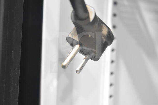 Close-up of the power plug for a 2018 True GDM-72-HC Commercial 3 Door Reach In Cooler, 115 Volts, 1 Phase.