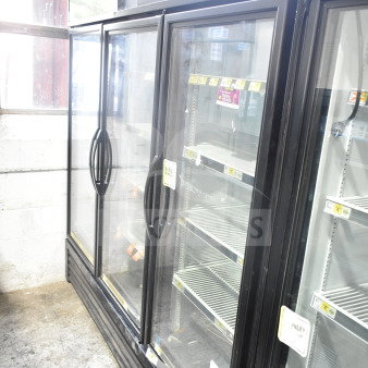 2018 True GDM-72-HC commercial 3-door reach-in cooler merchandiser, tested and working, 115 volts, 1 phase, black exterior.