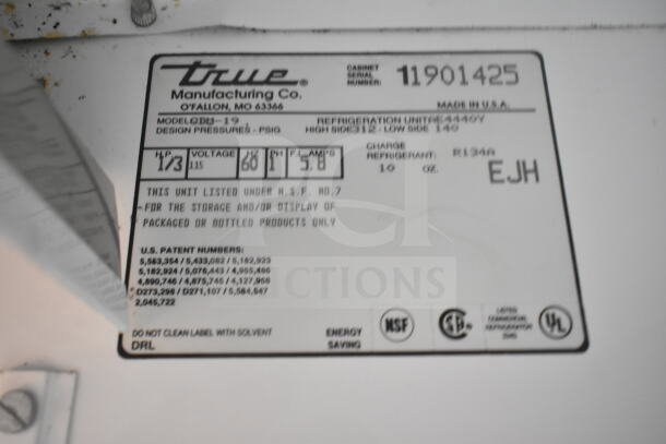 True GDM-19 Single Door Cooler, 115V, 1 Phase. Features model, voltage, refrigerant details on label.