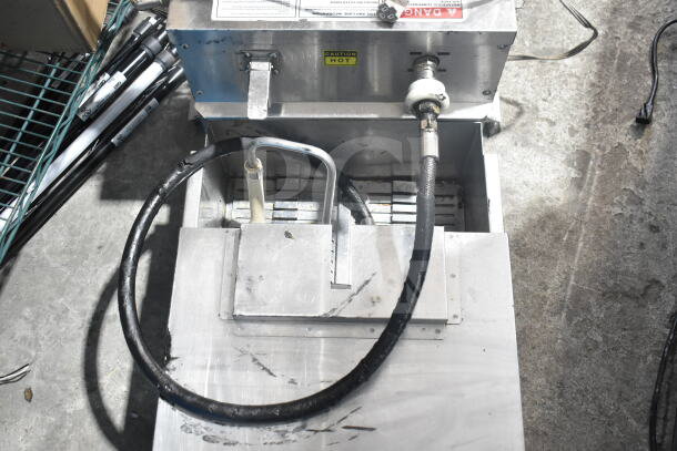 2021 Winston F662A9GE commercial fryer oil filter, stainless steel, 115 volts, 1 phase, with caution labels visible.