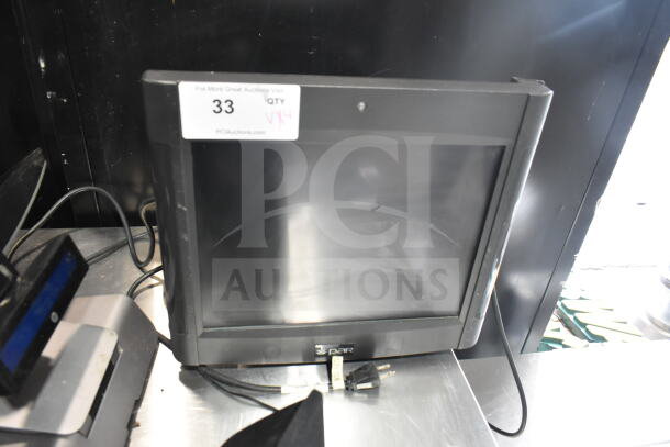 POS system with two monitors and speakers, item label indicates auction item number 33, used condition.