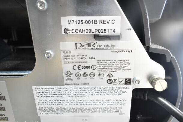 ParTech POS system label, model M7125-01. Input: 19V, 9.47A. Compliance details. Made in China, FCC ID: PD94965AGN.