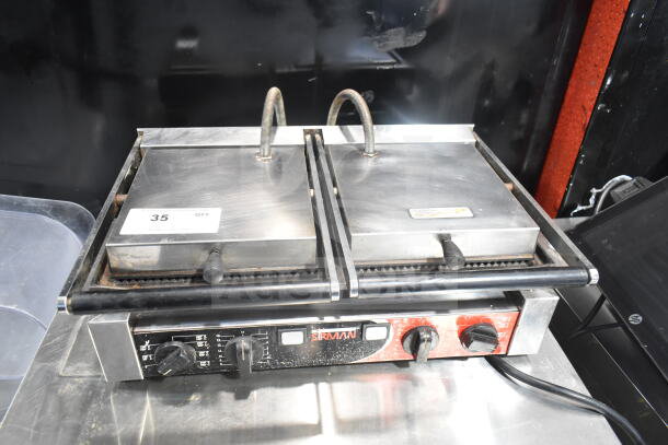 Sirman 16G02522 commercial double panini press, stainless steel, 230 volts, 1 phase, with visible controls and labels.