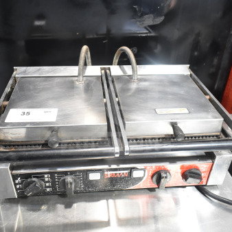 Sirman 16G02522 commercial double panini press, stainless steel, 230 volts, 1 phase, with visible controls and labels.
