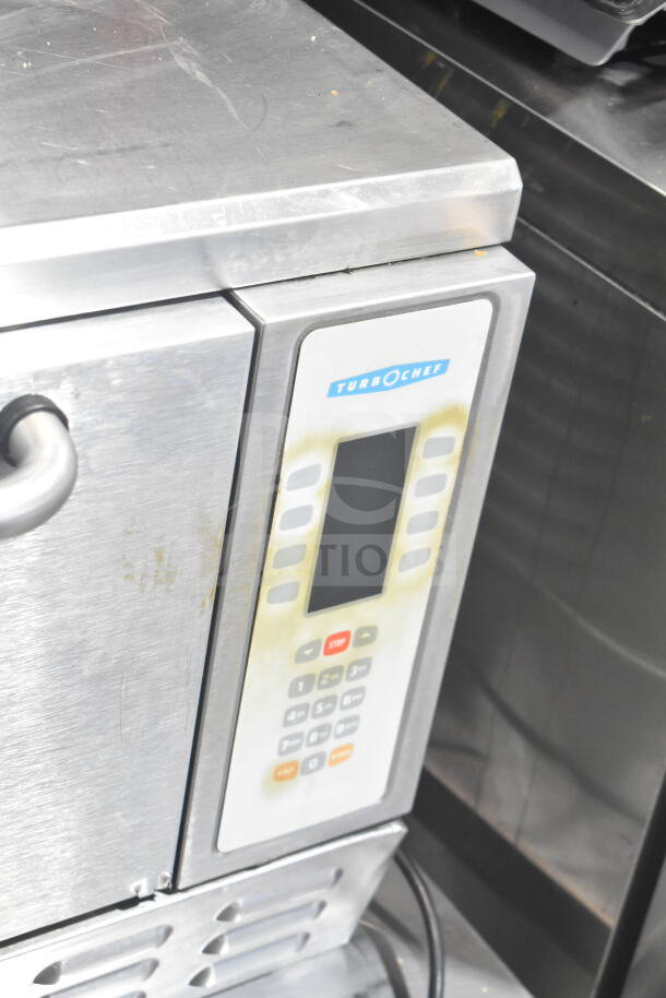Turbochef NGC countertop electric rapid cook oven, visible keypad, on a stand with casters. 120/208-240V, 1 phase.