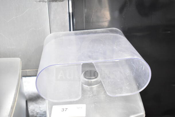 Taylor X83684-12 commercial drink mixing machine, clear plastic top, used condition, serial tag visible, lot number 37.