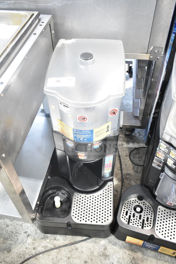 Taylor X81173-12 commercial countertop frozen beverage machine, silver, good condition, includes control panel and spout.