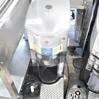 Taylor X81173-12 commercial countertop frozen beverage machine, silver, good condition, includes control panel and spout.
